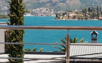 Apartment in a house with a private beach, private accommodation in city Krašići, Montenegro